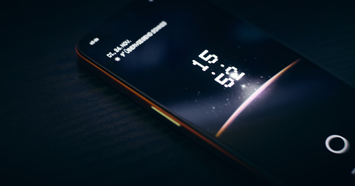 A close up of a cell phone on a table