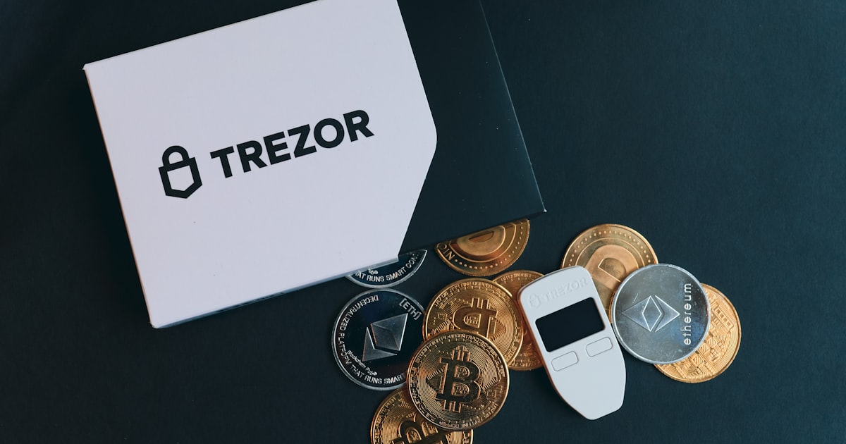 a pile of coins and a calculator next to it