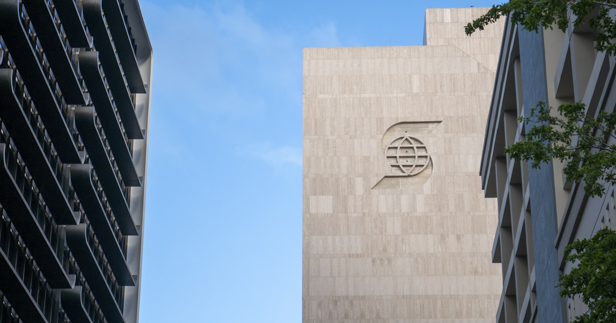 beige concrete building under blue sky during daytime