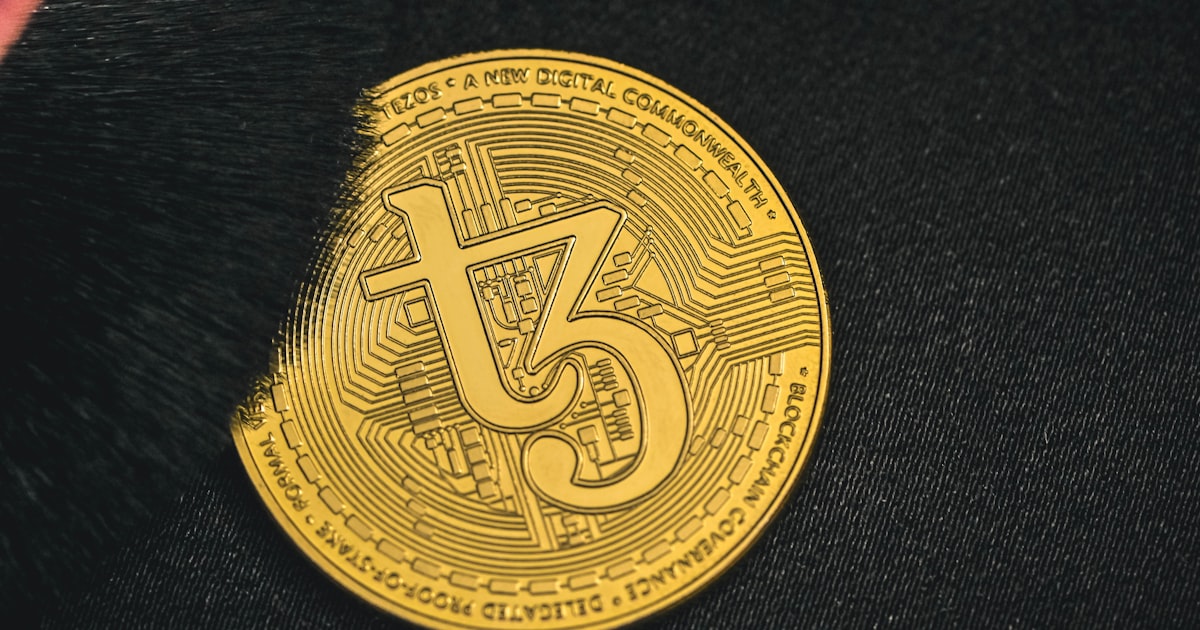 a close up of a coin on a black surface