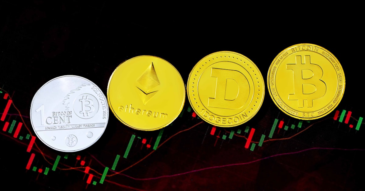 green red and yellow christmas tree and two round gold coins