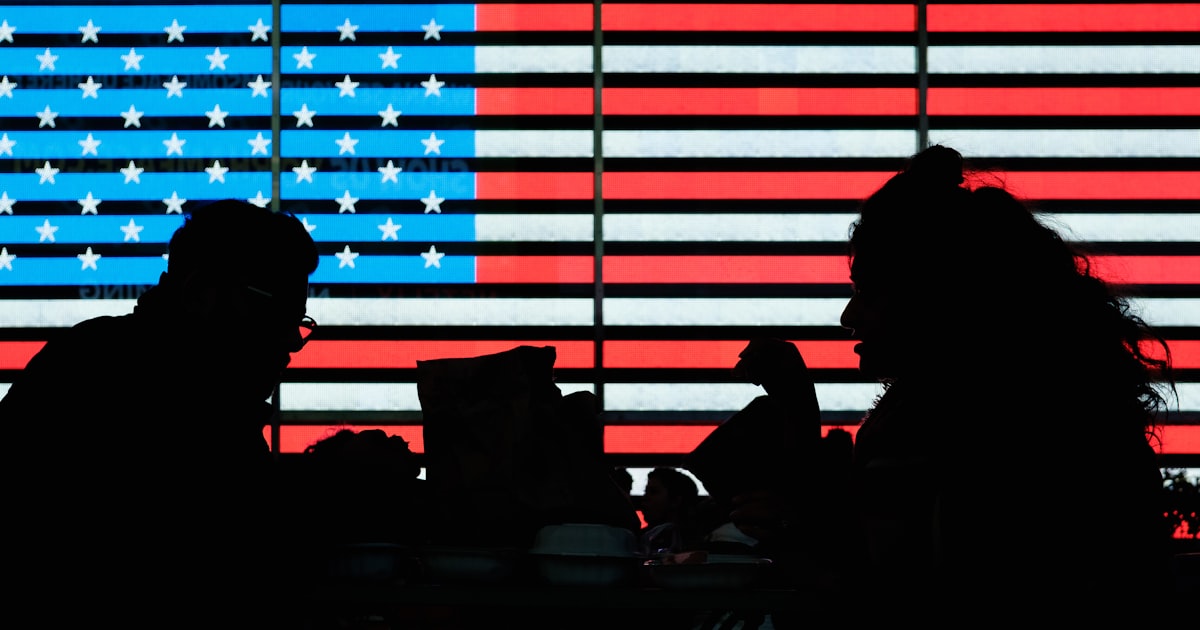 silhouette of people sitting on chair