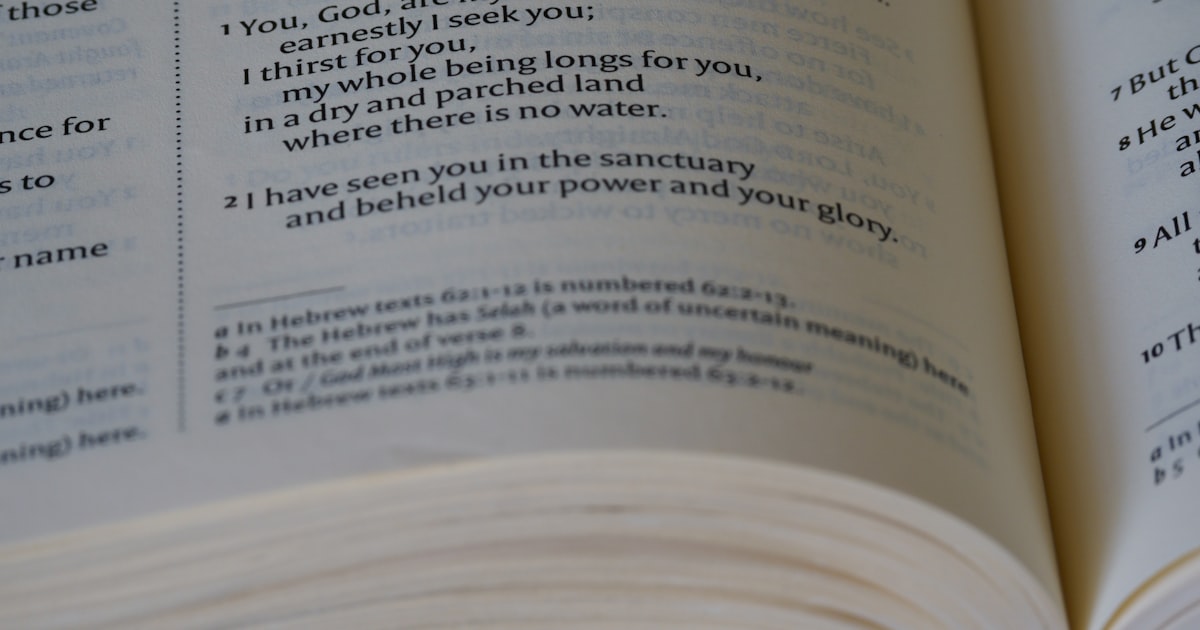 an open book with a poem on it