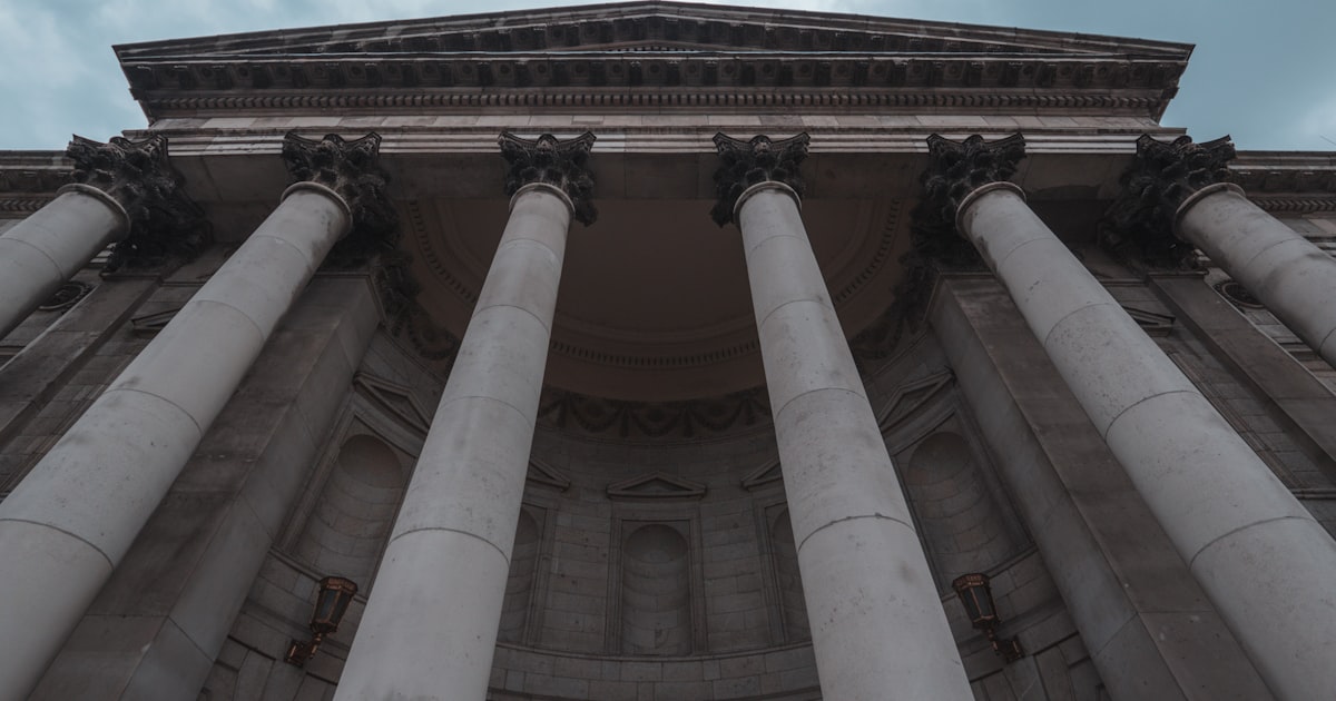 a very tall building with lots of columns