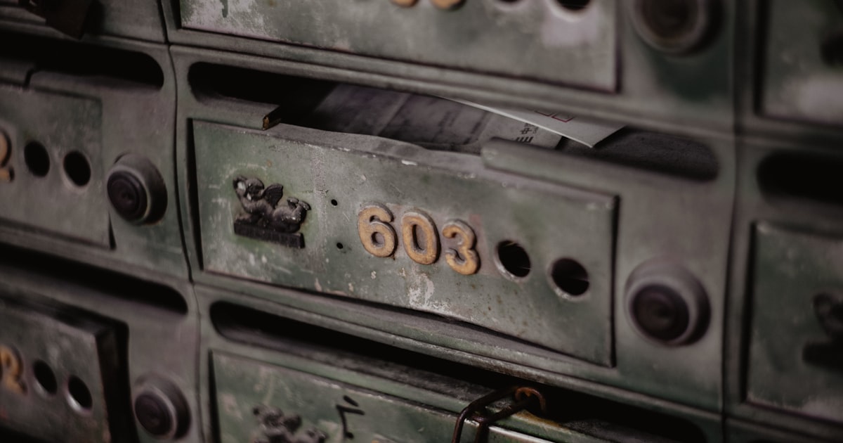 a bunch of metal lockers with numbers on them