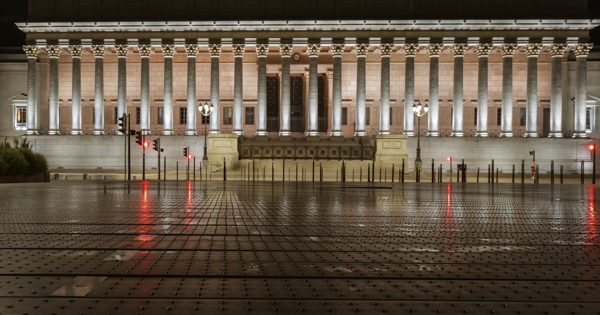 a large building with pillars