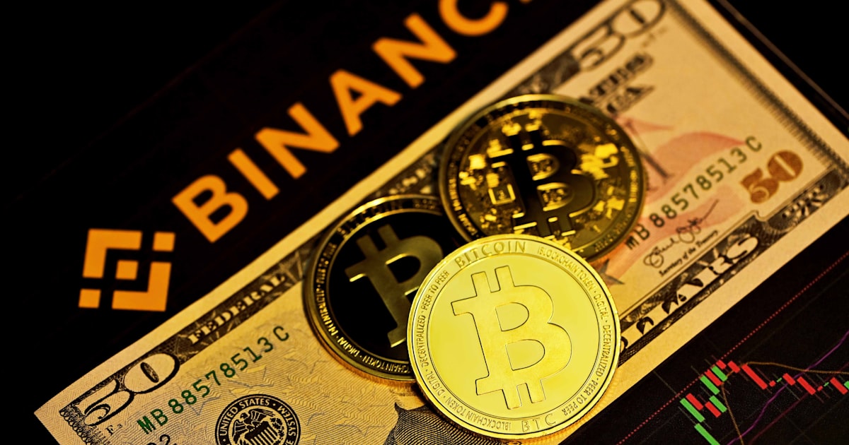 gold round coin on brown and black box