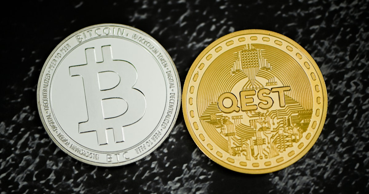 two bitcoins sitting next to each other on a table