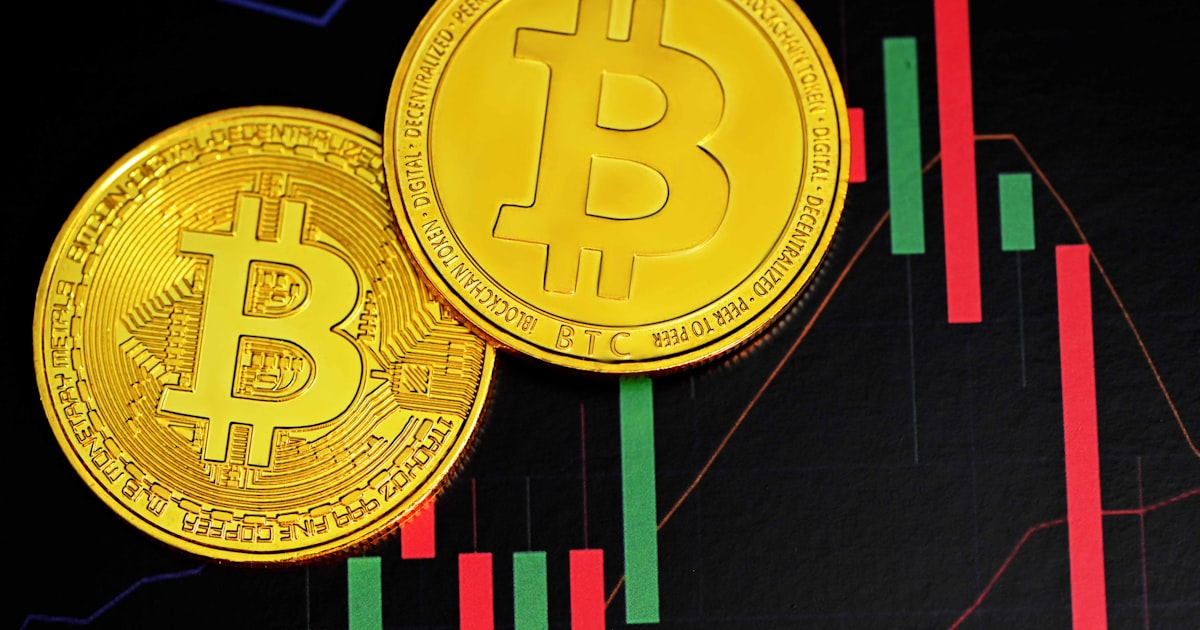 gold round coin on black textile