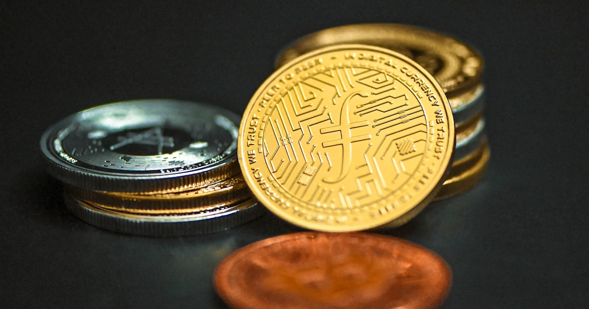 a pile of coins sitting on top of a table