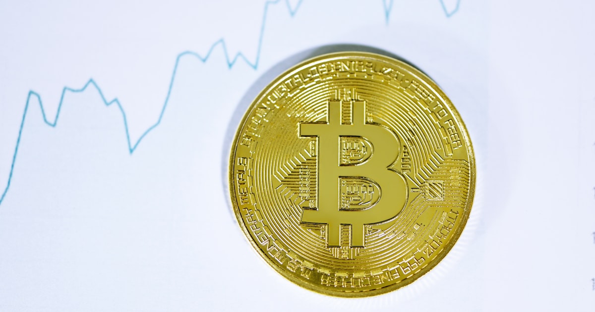 gold and silver round coin