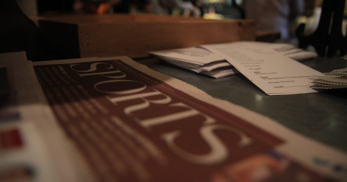 white printer paper on brown wooden table