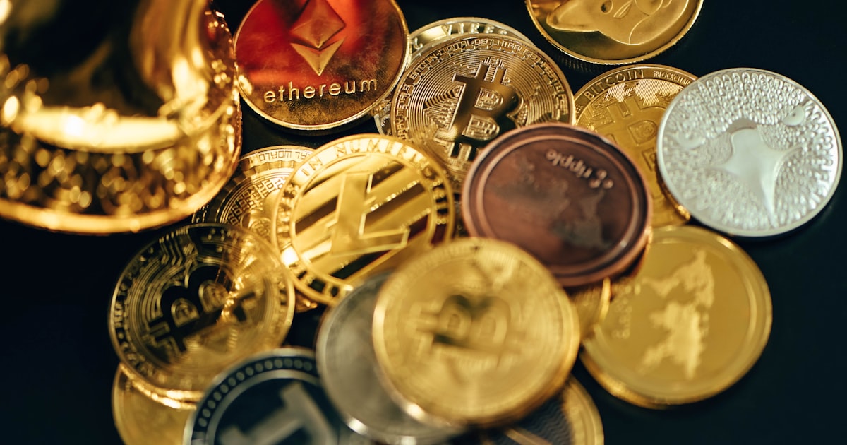 a pile of different types of coins