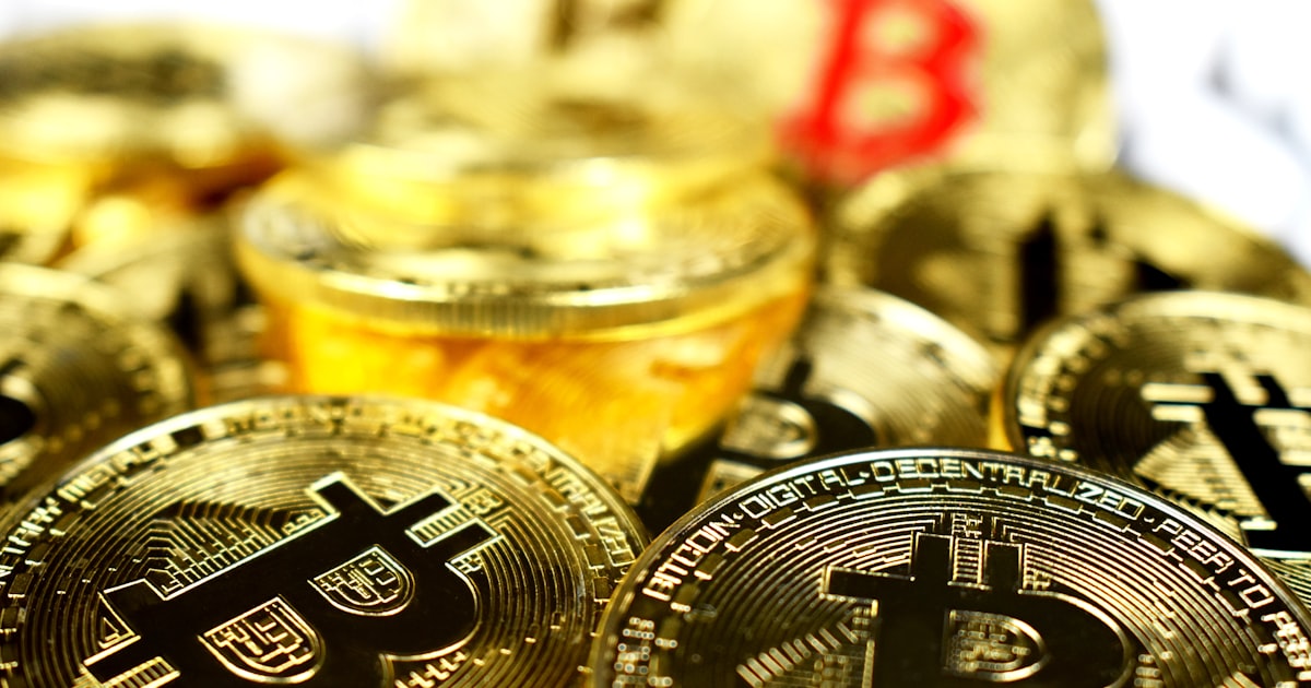 gold-colored bitcoin lot