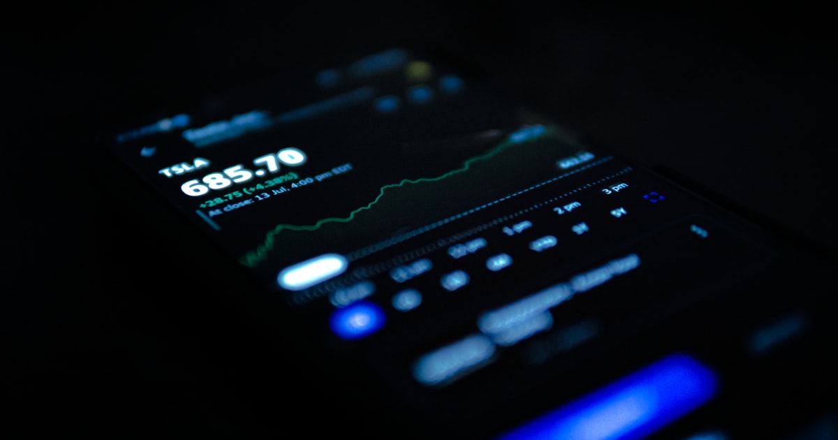 black android smartphone displaying 11 00