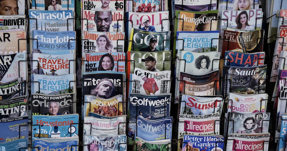 A pile of newspapers stacked on top of each other