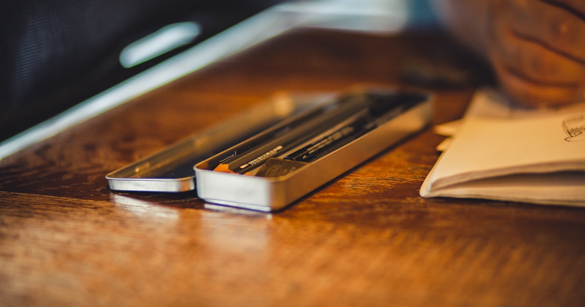 brown and black wooden sticks on brown wooden table