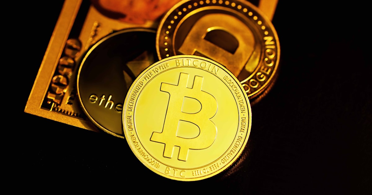 gold and silver round pendant