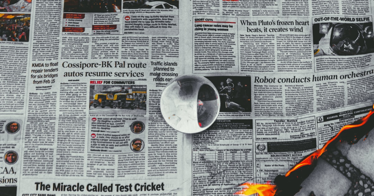 a newspaper with a picture of a cd and a guitar