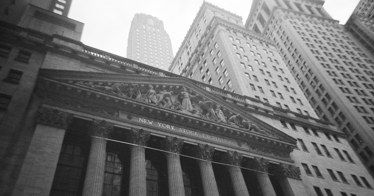 A black and white photo of a building in new york city