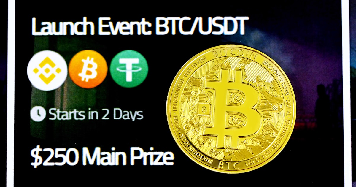 a picture of a bitcoin sign with the words launch event btc /