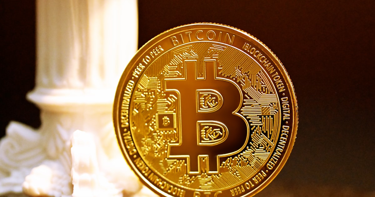 a bit coin sitting on top of a table