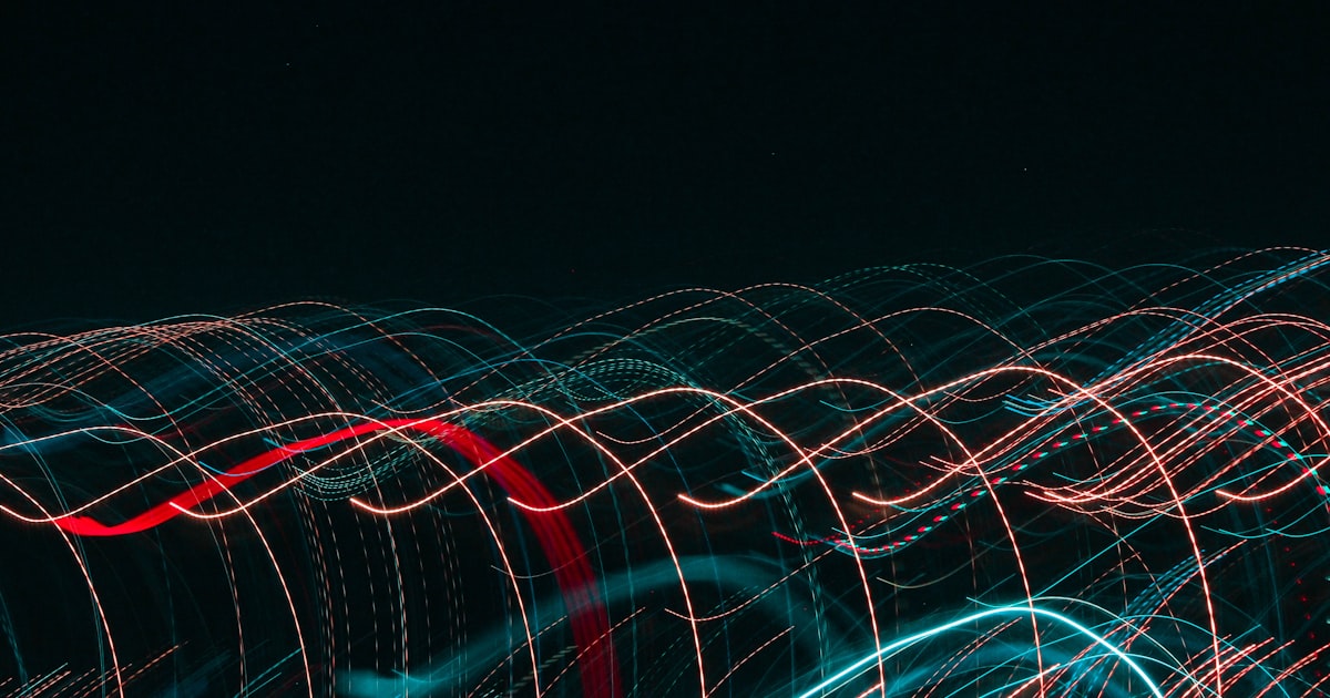 a blurry photo of a street light at night