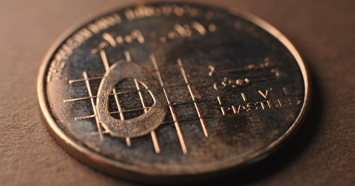 A close up of a coin on a table