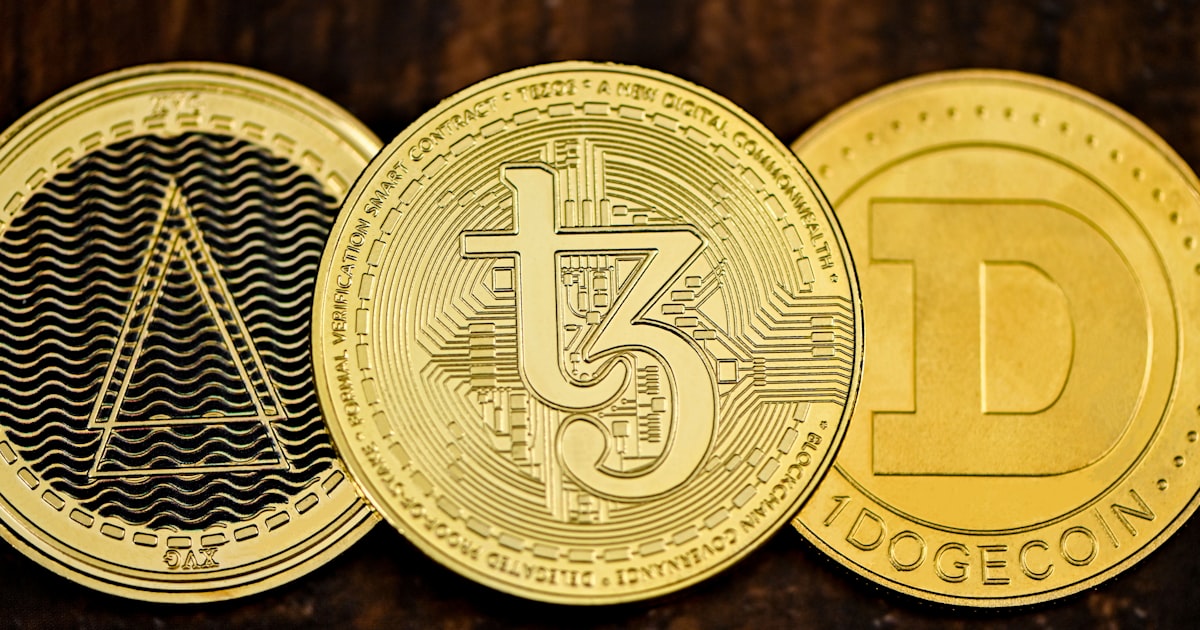 a close up of three different types of coins