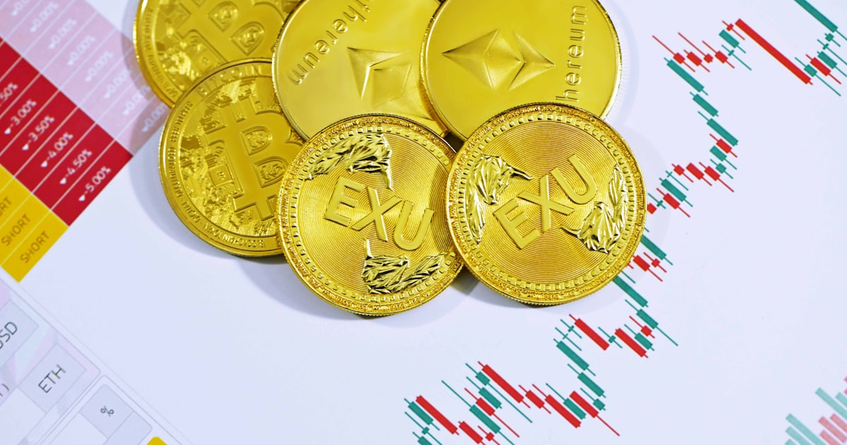 gold round coins on white surface