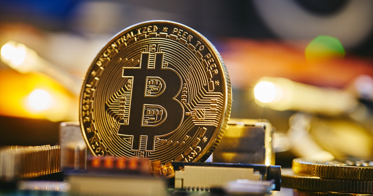 a bit coin sitting on top of a table