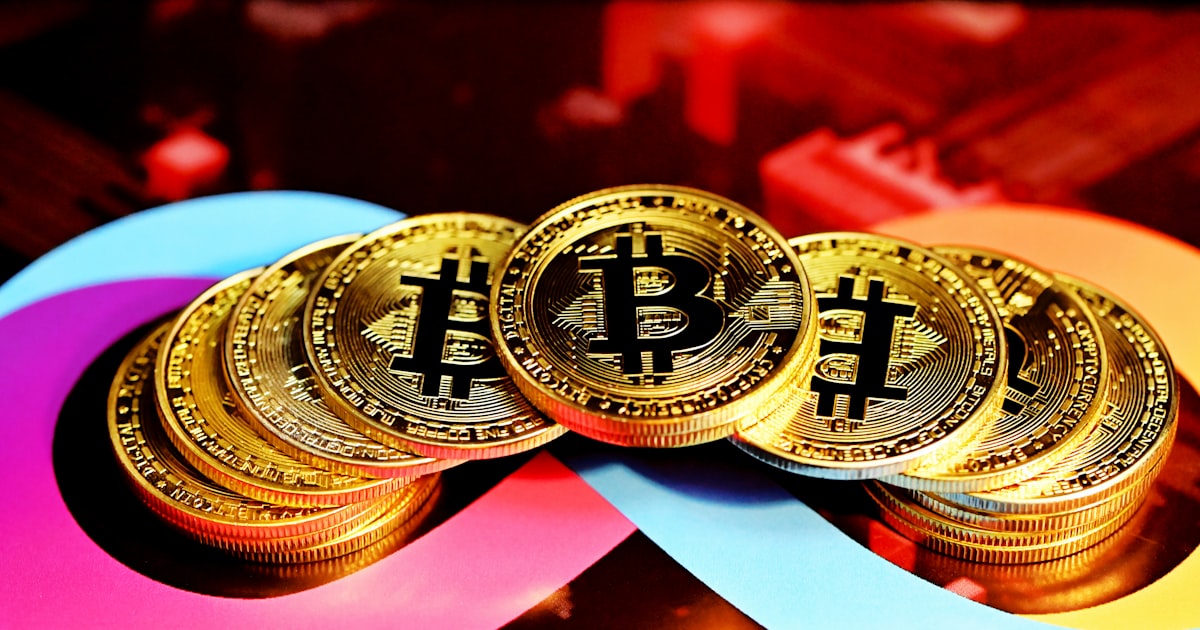 a pile of bitcoins sitting on top of each other