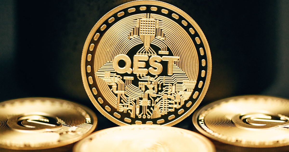 a bitcoin sitting on top of a pile of gold coins