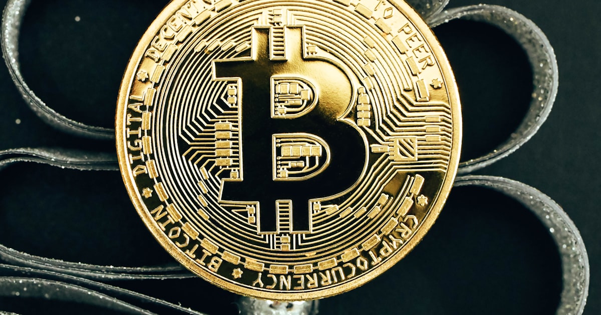 a bit coin sitting on top of a table