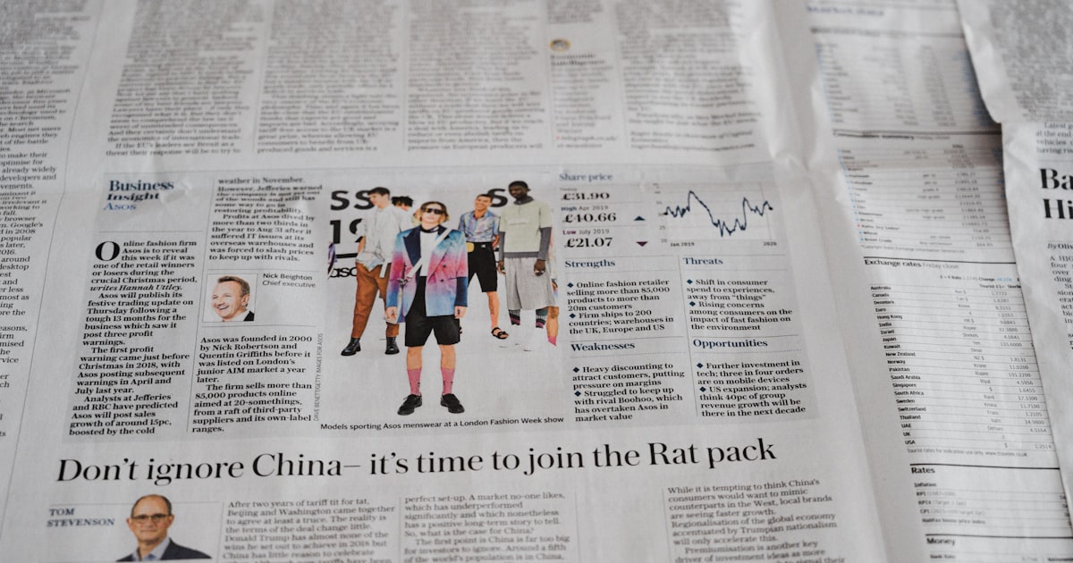 a newspaper with a picture of a man on it
