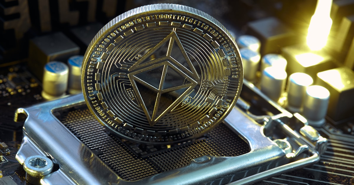 a close up of a computer chip with a gold star on it