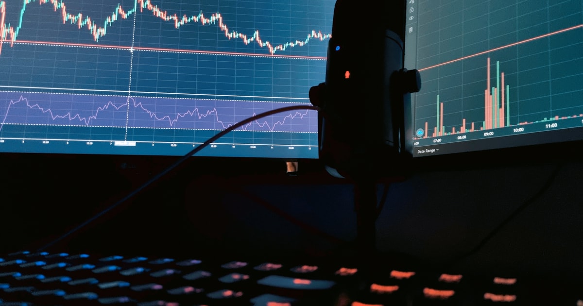 a computer monitor with a keyboard and mouse