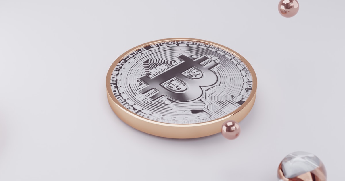 a coin sitting on top of a white surface