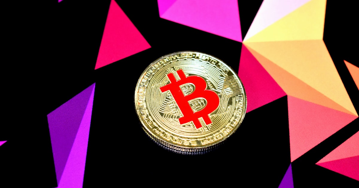 purple and white round logo