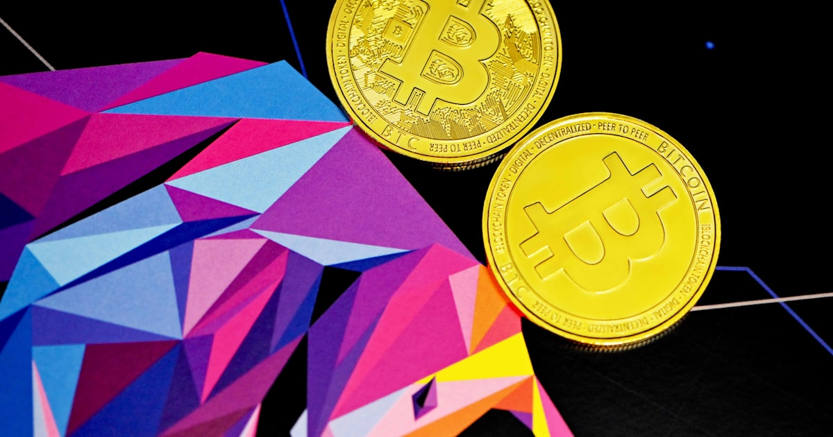 gold round coins on blue and pink paper
