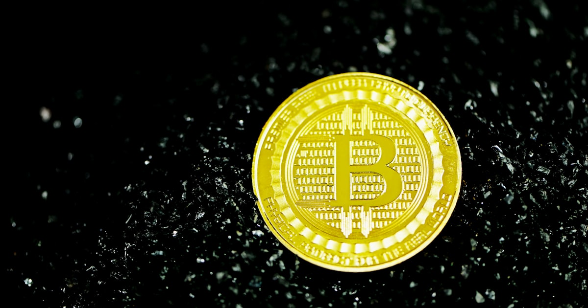 gold and silver round coin