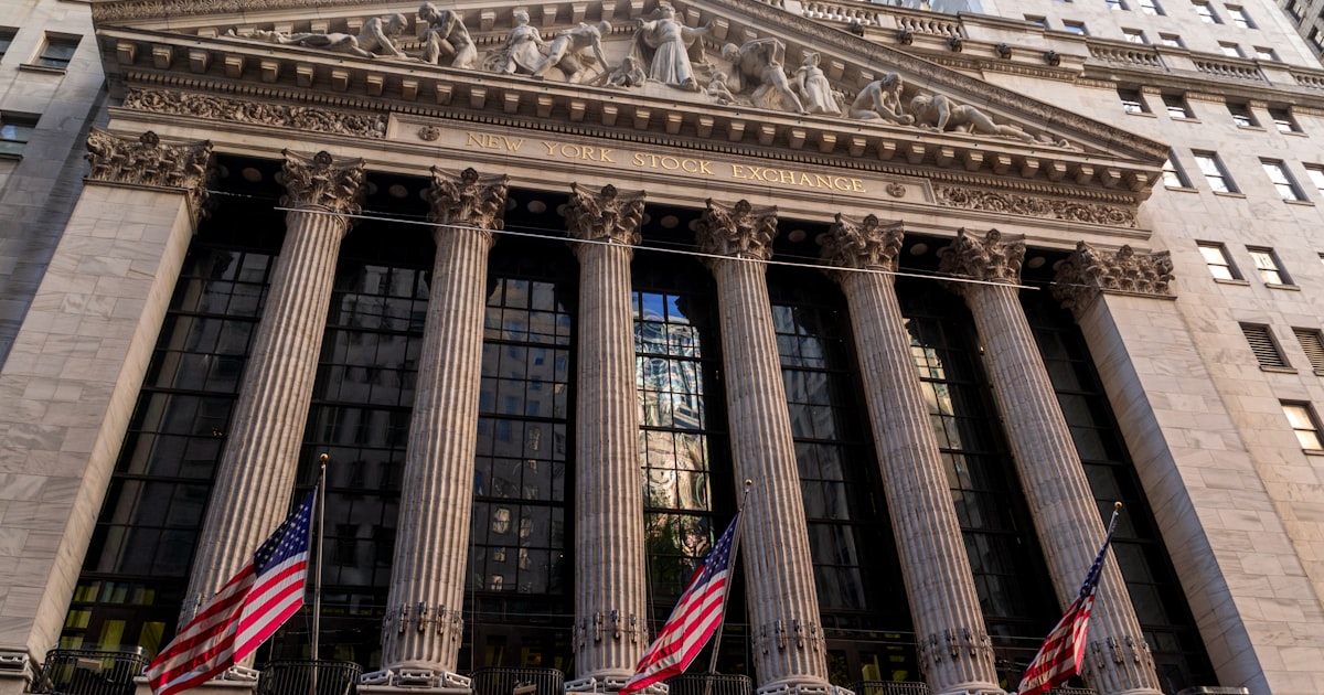 New york stock exchange building with american flags