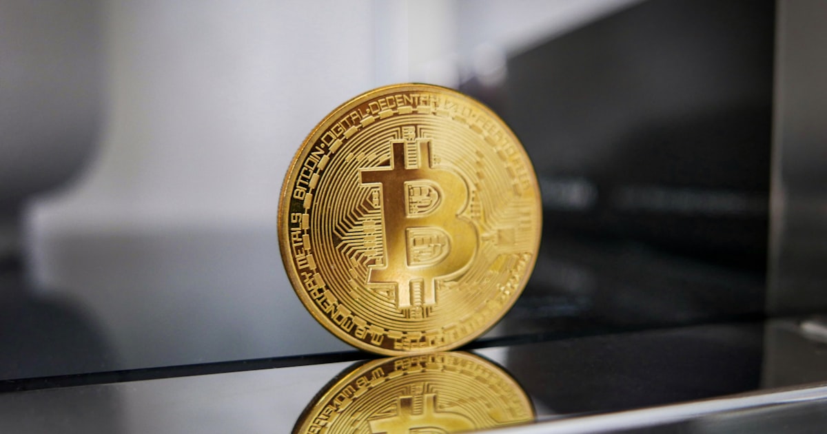 a bit coin sitting on top of a counter