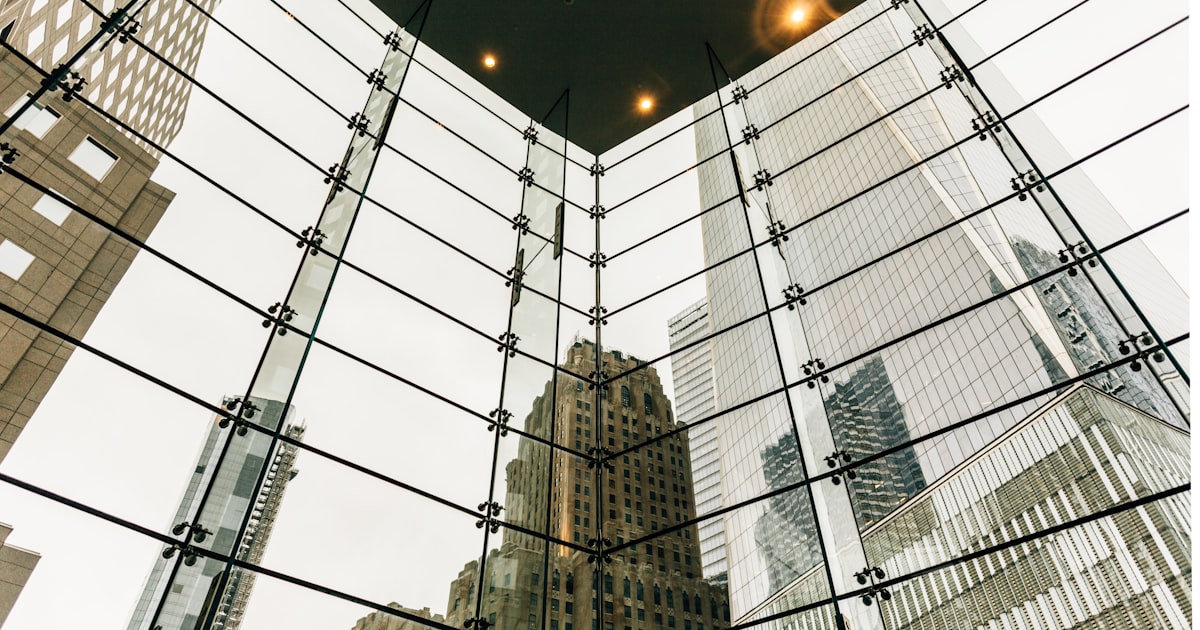 gray high-rise building at night time