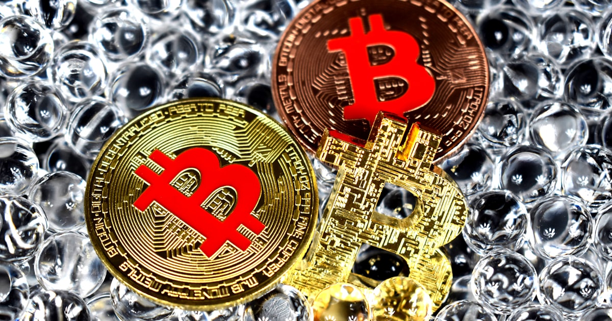 gold and red round coin