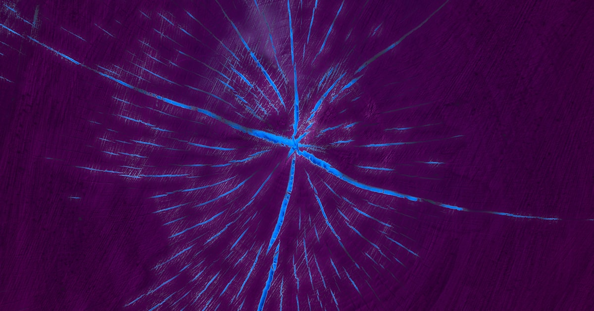 a purple background with blue lines in the center