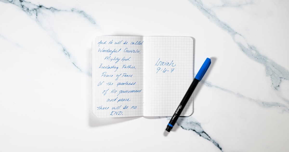 white printer paper with blue pen