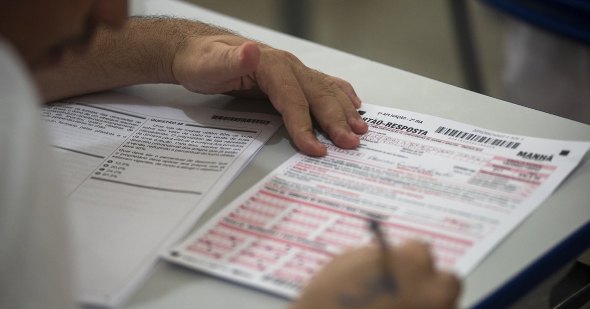 person filling on application form