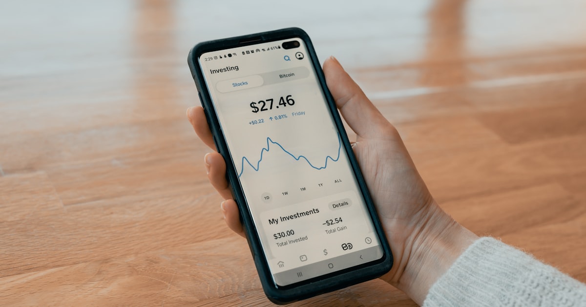 person holding black android smartphone