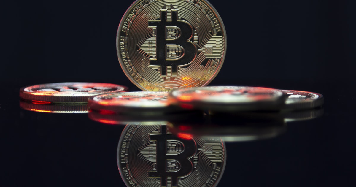 a bit coin sitting on top of a table